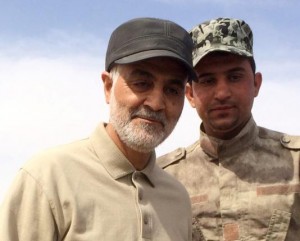 Iranian Revolutionary Guard Commander Qassem Soleimani (L) stands at the frontline during offensive operations against Islamic State militants in the town of Tal Ksaiba in Salahuddin province March 8, 2015. Picture taken March 8, 2015. REUTERS/Stringer