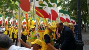 Iranians demonstrate outside the UN HQ in NY against visit of Iranian regime President