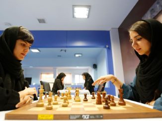 Iranian women take part in a chess tournament in Tehran last October. Dorsa Derakhshani was banned from playing for Iran for not wearing a hijab. Photograph: Atta Kenare/AFP/Getty Images